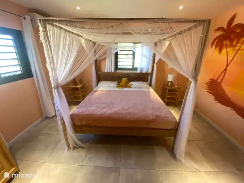 Air-conditioned bedroom at Queen of the Hill Villa